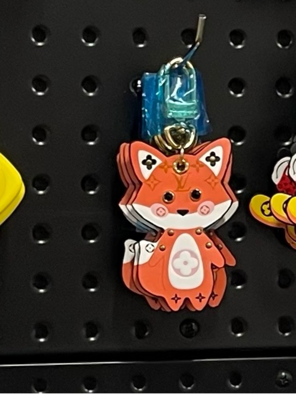 IYKYK-upcycledIVOrange fox Keychain/purse charm with playful monogram detail -